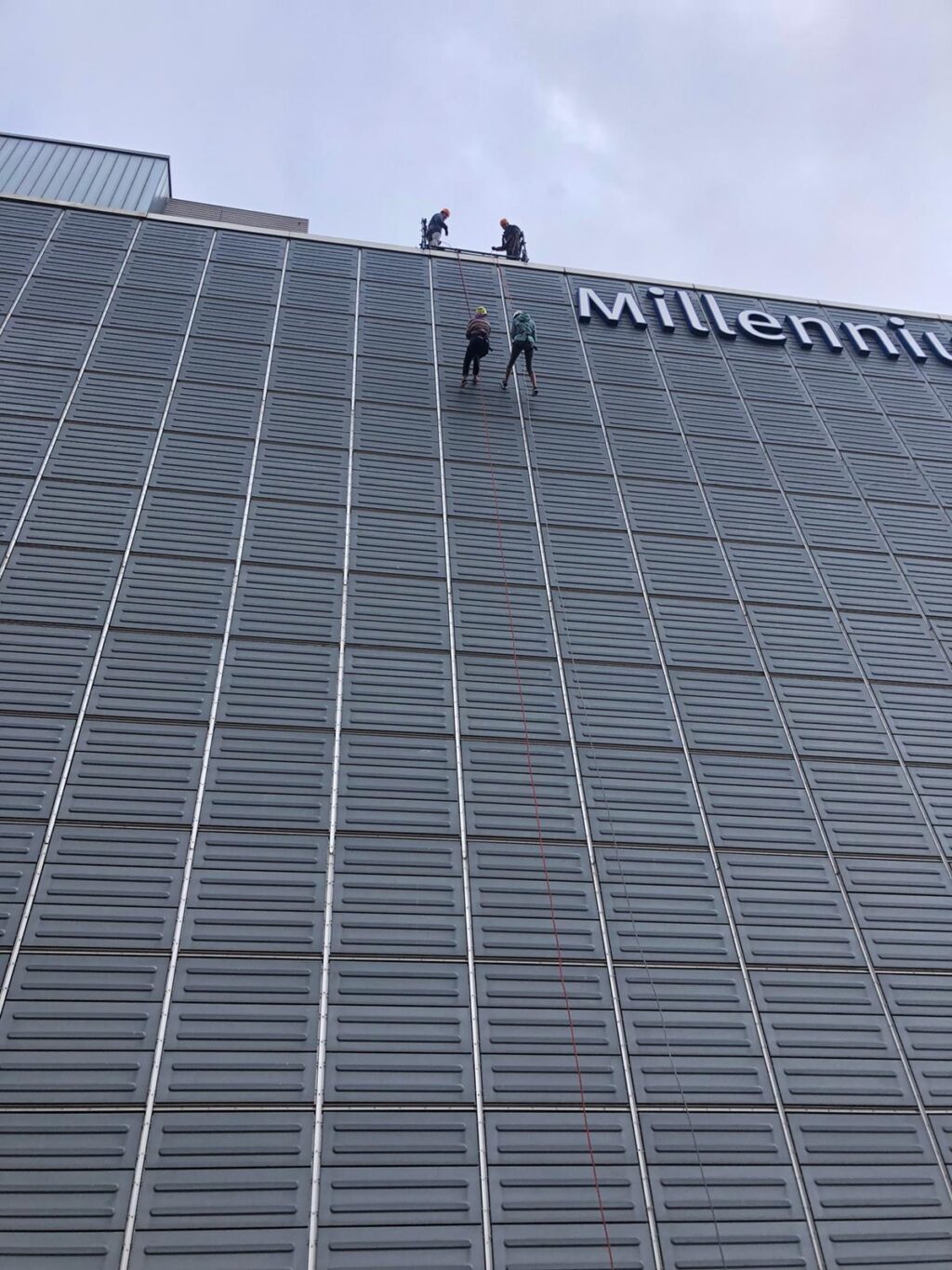 Megan Carthy and Rebecca Beale abseiling down Millennium Point for Birmingham Children's Hospital