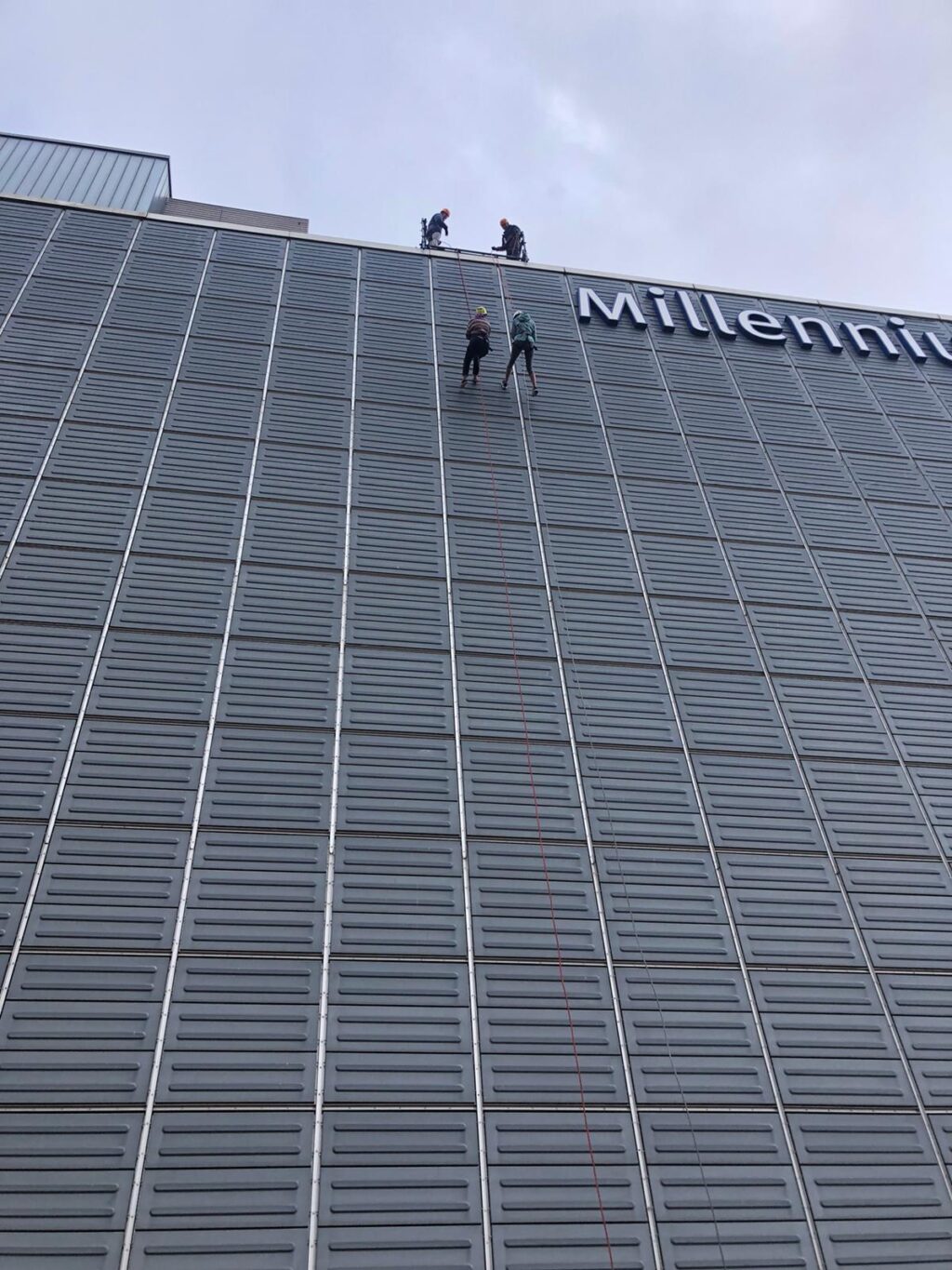 Megan Carthy and Rebecca Beale abseiling down Millennium Point for Birmingham Children's Hospital